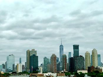 Modern buildings in city against sky