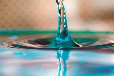 Close-up of water drops on table