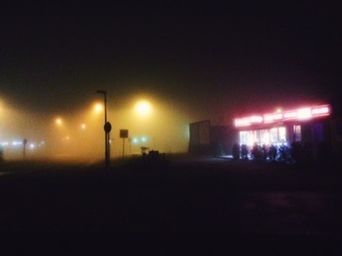 Illuminated street light at night