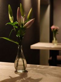 Close-up of flower vase on table
