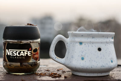 Close-up of coffee cup on table