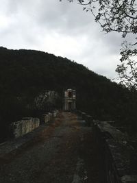 Built structure on land against sky