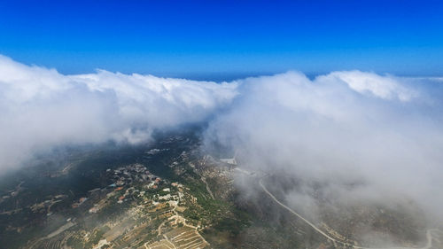 Clouds over countryside landscape