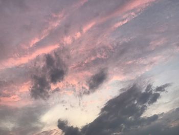 Low angle view of dramatic sky during sunset