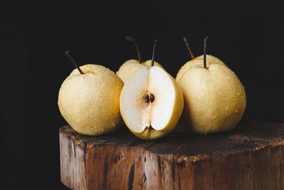 Close-up of fruits against black background