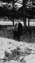 Woman sitting on field