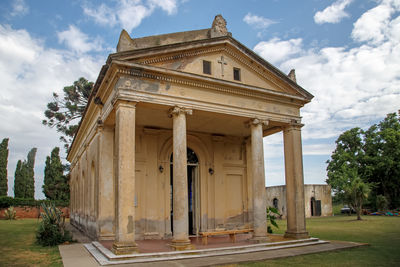 Low angle view of historic building against sky