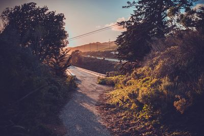 Scenic view of landscape against sky at sunset