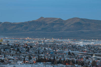 High angle view of town against mountains