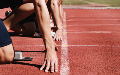 Low section of athletes on running track