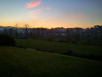 Scenic view of landscape against sky during sunset