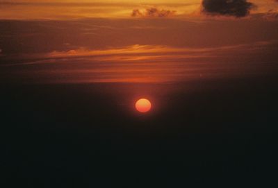 Scenic view of dramatic sky during sunset