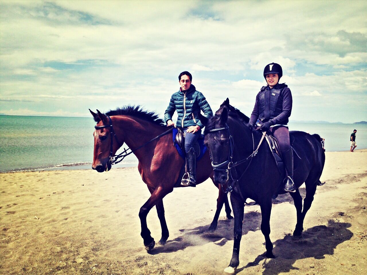 domestic animals, animal themes, horse, working animal, lifestyles, sky, mammal, men, full length, riding, sand, horseback riding, leisure activity, beach, livestock, togetherness, cloud - sky, walking