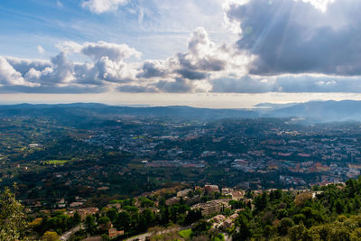 Aerial view of townscape against sky