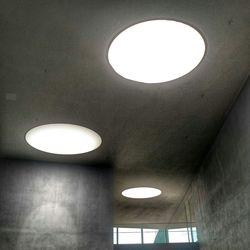 Low angle view of illuminated ceiling