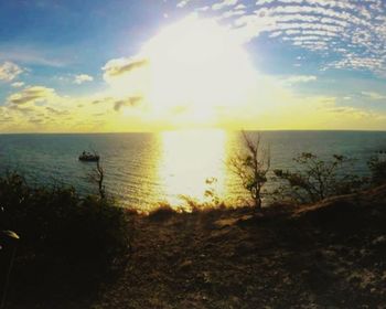 Scenic view of sea at sunset