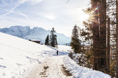 Scenic view of snow covered mountains against sky