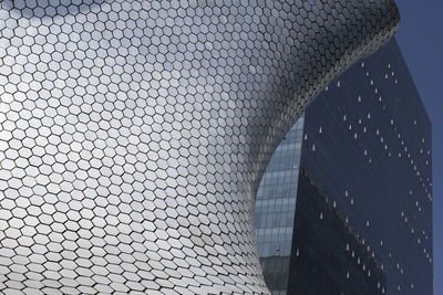 Low angle view of modern building against sky