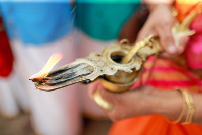 Close-up of woman holding hands