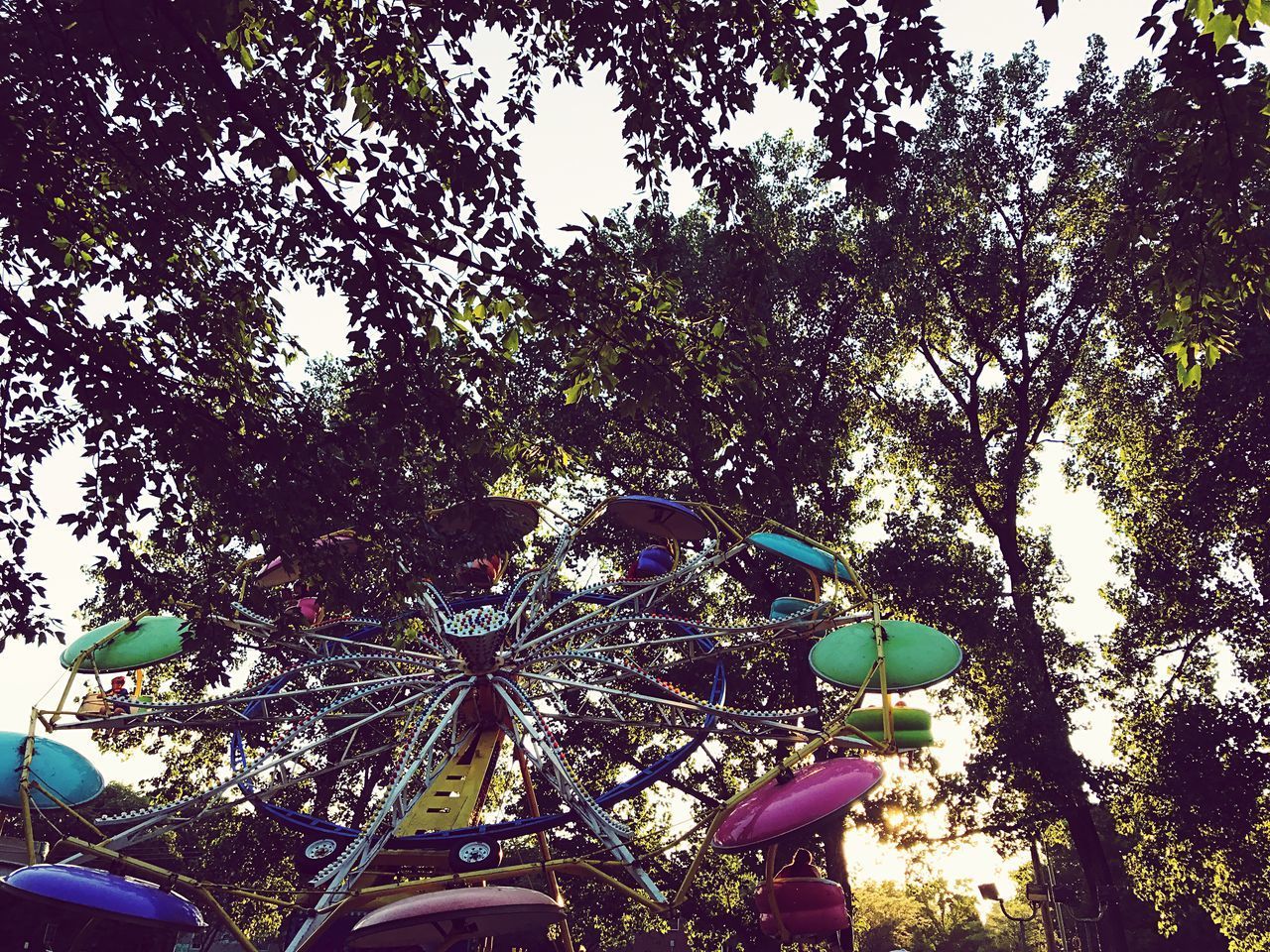 LOW ANGLE VIEW OF ROLLERCOASTER AGAINST SKY