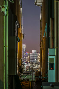 Modern buildings in city against clear sky