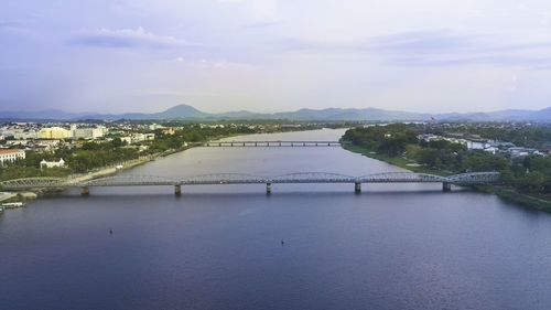 Bridge over river against sky