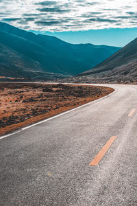 Road leading towards mountain