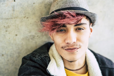 Portrait of young man wearing hat