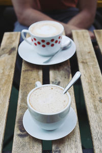 Close-up of coffee cup on table