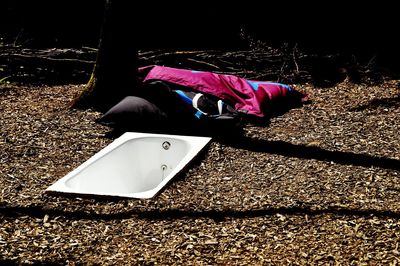 High angle view of person sitting on field