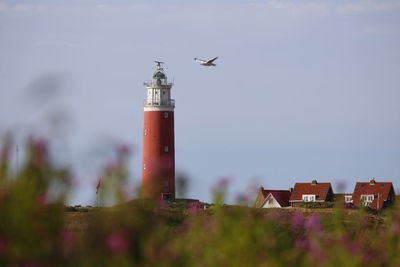 Low angle view of lighthouse against sky