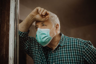 Portrait of man wearing mask