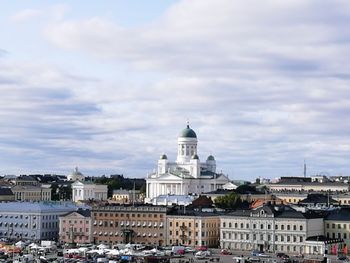 View of city against cloudy sky