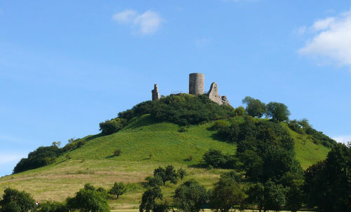 Low angle view of desenberg against blue sky