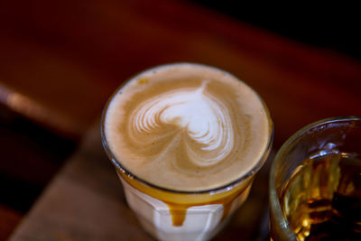 High angle view of coffee cup on table