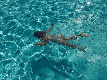 High angle view of person swimming in pool