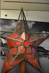 Close-up of red boat against sky