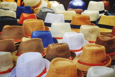 Full frame shot of various hats for sale at market stall