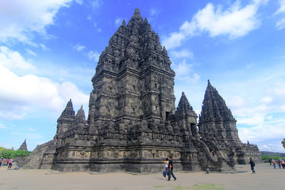 Group of people in temple against building