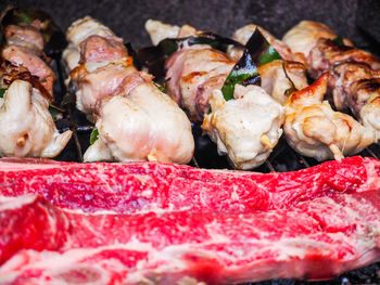 Close-up of meat on barbecue