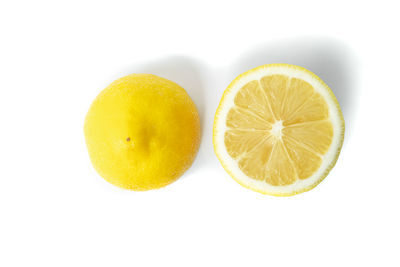 Close-up of oranges against white background