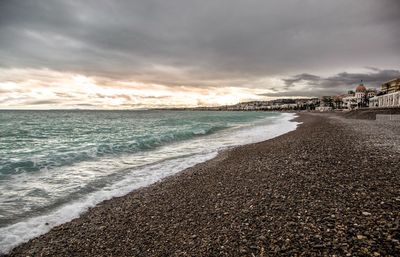 Scenic view of beach against sky