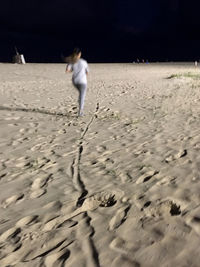 Man walking on beach