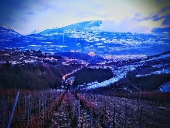 Scenic view of snow covered mountains against sky