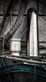 Close-up of old pipe against wall