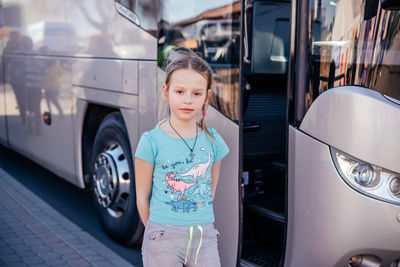 Medyka, poland - march 24, 2022 a ukrainian girl standing by bus at ukrainian-polish border