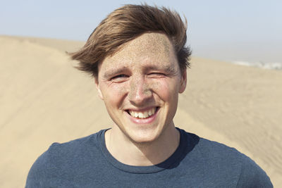 Smiling man on beach