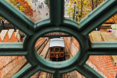 High angle view of train seen through metal