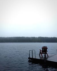 Empty jetty in calm lake