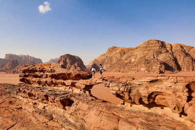 Rock formations on mountain against sky